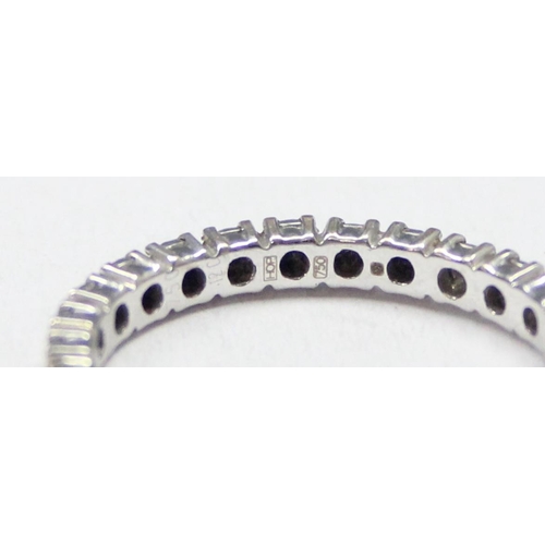 1154 - 18ct white gold and diamond eternity ring, marked 750 and XRF confirmed, approx size O, approx 2.56g... 