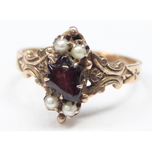 1157 - An antique 9ct gold seed pearl and pink stone ring, possibly a ruby or garnet, likely 19th century, ... 