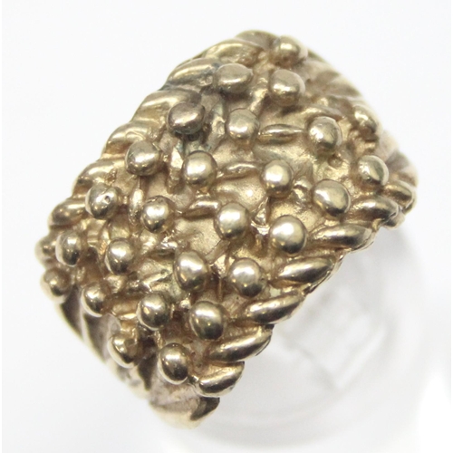 1163 - A vintage 9ct gold keeper ring of woven design, marked for London 1995, approx size T, approx 10.24g... 