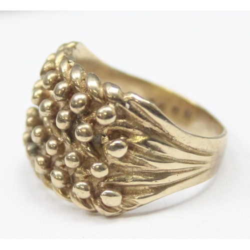 1163 - A vintage 9ct gold keeper ring of woven design, marked for London 1995, approx size T, approx 10.24g... 