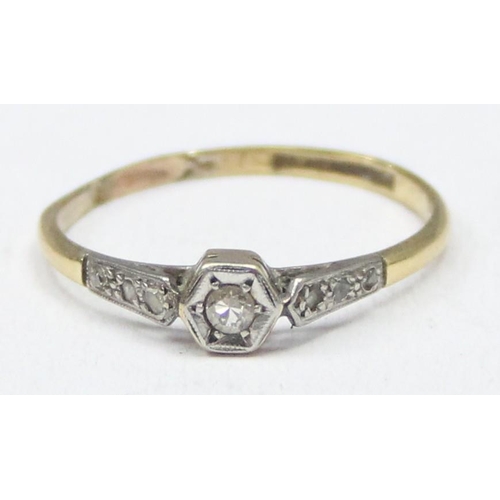 1168 - An 18ct gold and platinum set solitaire diamond ring with diamond set shoulders, approx size Q, appr... 