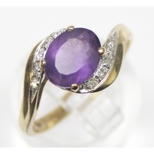 1170 - A vintage 9ct gold diamond and amethyst ring in crossover setting, marked and XRF confirmed, approx ... 