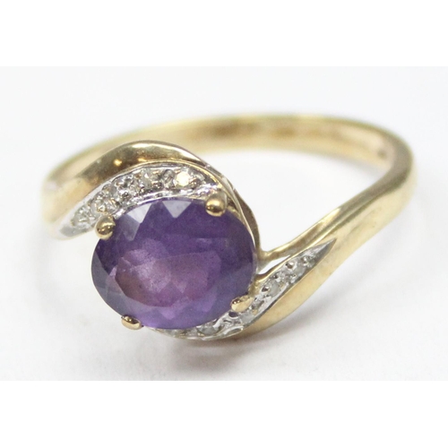 1170 - A vintage 9ct gold diamond and amethyst ring in crossover setting, marked and XRF confirmed, approx ... 