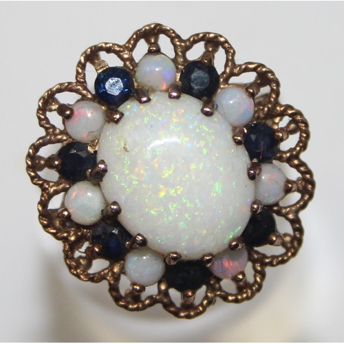 1172 - A large 9ct gold opal and sapphire cluster ring, marked for London 1972 and XRF confirmed, approx si... 