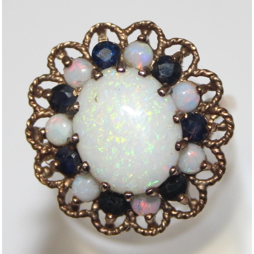 1172 - A large 9ct gold opal and sapphire cluster ring, marked for London 1972 and XRF confirmed, approx si... 