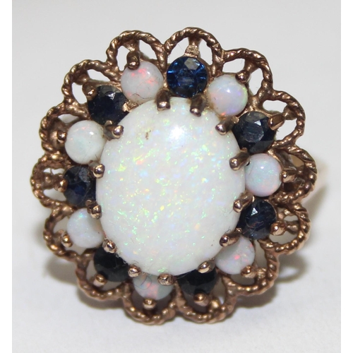 1172 - A large 9ct gold opal and sapphire cluster ring, marked for London 1972 and XRF confirmed, approx si... 