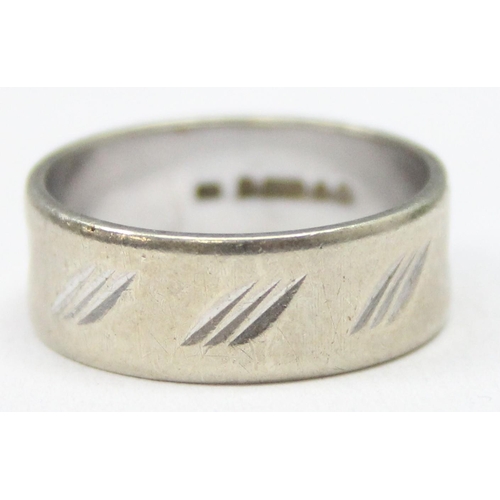 1174 - 9ct white gold band ring with engraved decoration, marked for London 1970 and XRF confirmed, approx ... 