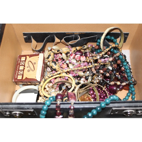 1107 - Case of assorted vintage costume jewellery