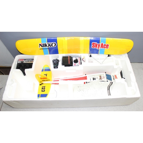 1512 - Nikko 51152 Sky Ace remote controlled plane in box and a boxed remote controlled helicopter (2)