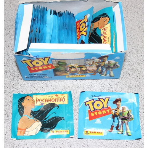 1513 - Qty of assorted Panini stickers and Pogs to inc unopened packs of Toy Story & Pocahontas stickers, B... 