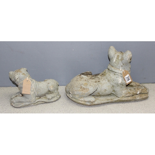 316 - 2 concrete garden dog figures, the largest approx 40cm wide