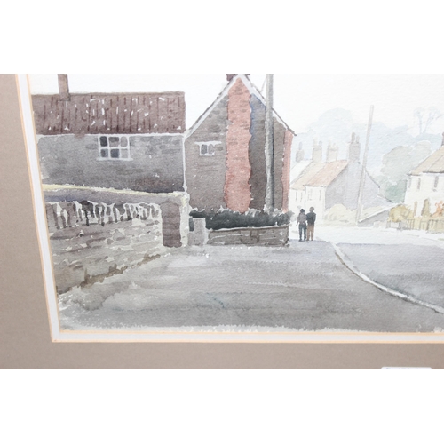 423 - Original watercolour of a street scene in frame, dated 1985 signed K A Head, approx 75cm x 57cm