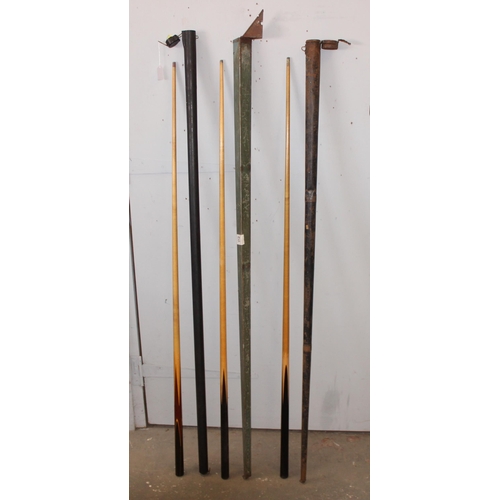 702 - 3 vintage snooker cues in long metal club cases