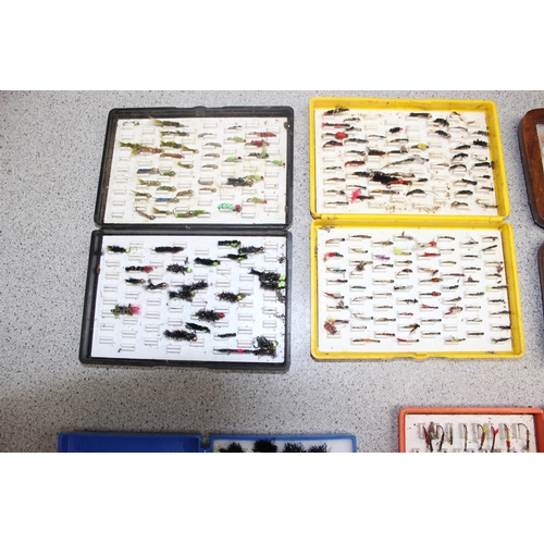 705 - 7 assorted fly fishing boxes with contents