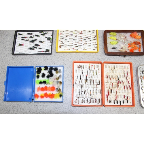 705 - 7 assorted fly fishing boxes with contents