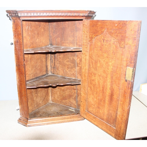 78 - A Georgian Oak corner cabinet, approx 59cm wide x 87cm tall