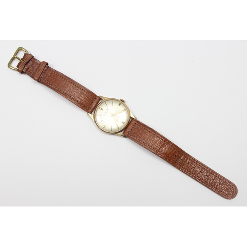 1300 - A vintage 9ct gold cased Rotary wristwatch with brown leather strap, case marked for Birmingham 1987... 