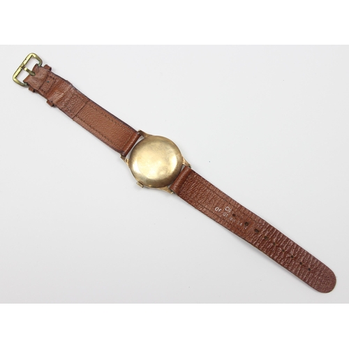 1300 - A vintage 9ct gold cased Rotary wristwatch with brown leather strap, case marked for Birmingham 1987... 