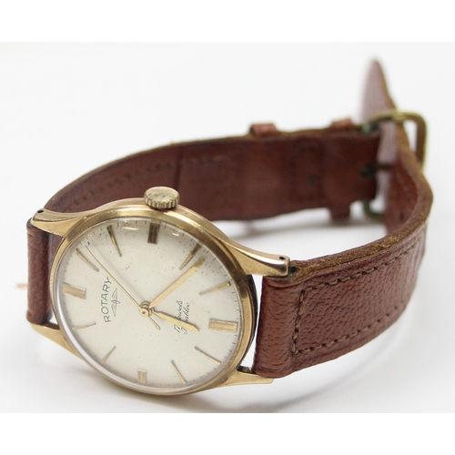 1300 - A vintage 9ct gold cased Rotary wristwatch with brown leather strap, case marked for Birmingham 1987... 