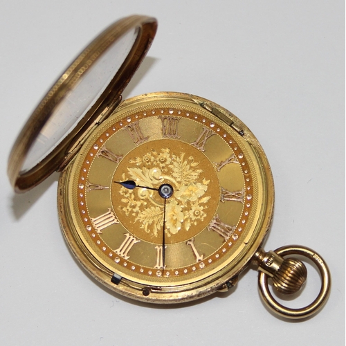 1309 - An antique 18ct gold cased pocket or fob watch with decorative dial, unmarked movement, case marked ... 