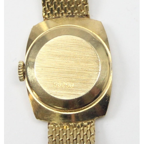 1318 - A vintage 18ct gold Nivada Swiss made watch, the retro bark effect strap and case marked 750 and wit... 