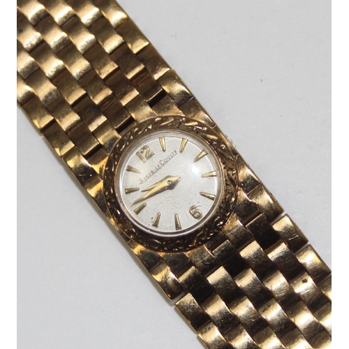 1319 - A vintage ladies Jaeger Le Coultre watch with heavy 9ct gold mesh strap, marked 375 in various place... 