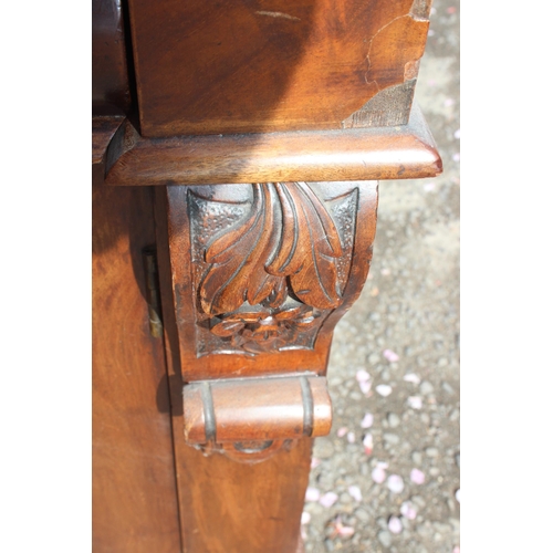 153 - A Victorian mahogany sideboard with 2 concealed drawers over 2 cupboards, approx 132cm wide x 51cm d... 