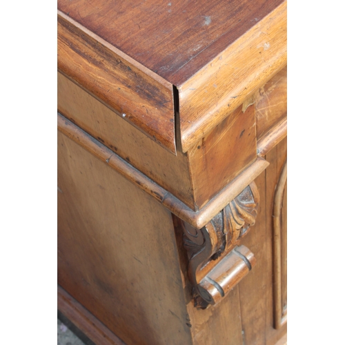 153 - A Victorian mahogany sideboard with 2 concealed drawers over 2 cupboards, approx 132cm wide x 51cm d... 