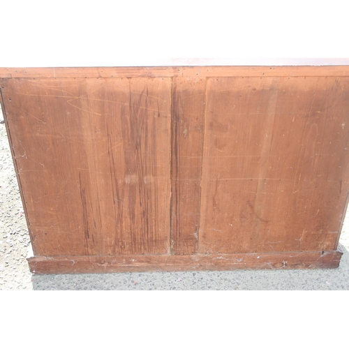 153 - A Victorian mahogany sideboard with 2 concealed drawers over 2 cupboards, approx 132cm wide x 51cm d... 