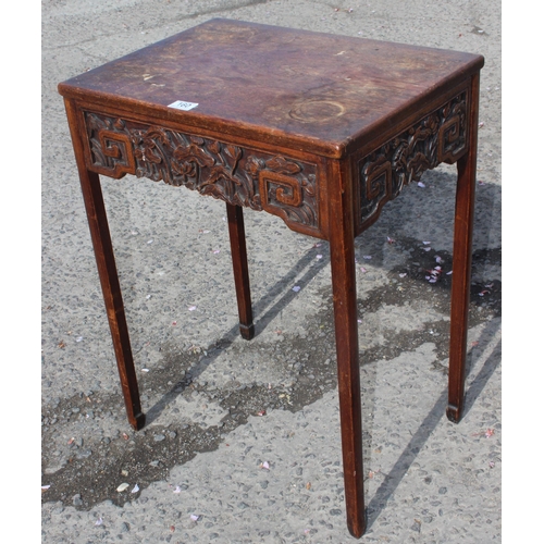 160 - A nest of 2 Oriental tables with carved frieze, likely early 20th century, largest approx 52cm wide ... 