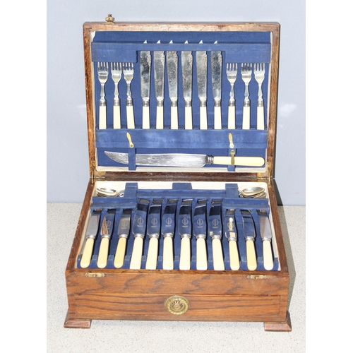 1024 - 6 place setting stainless steel cutlery set in oak canteen with beaded detail, with some additional ... 