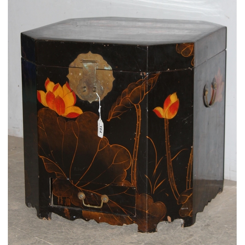 104 - A 20th century Chinese lacquered storage box, with brass handles and locking plate, decorated with w... 