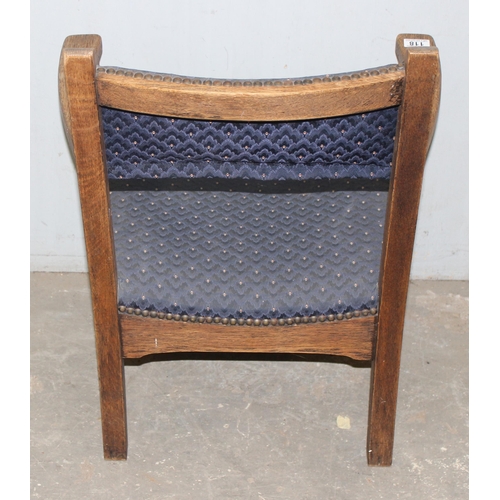 118 - An early 20th century low seated vintage oak lounge chair with later blue upholstery, approx 70cm ta... 