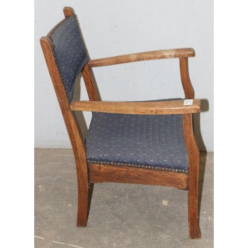 118 - An early 20th century low seated vintage oak lounge chair with later blue upholstery, approx 70cm ta... 