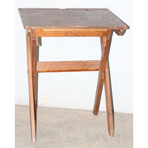 121 - Vintage pine folding school desk or x-frame table, approx 61cm wide x 43cm deep x 73cm tall