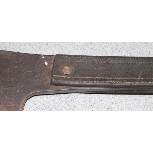 1411 - Large long-handled cleaver with leather-covered handle, bears cross-hammer mark with initials W. G f... 