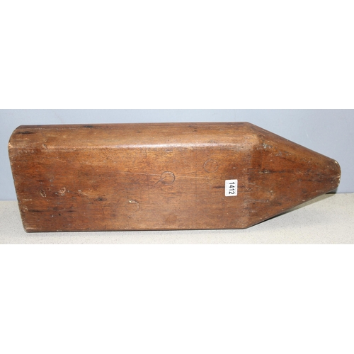 1412 - Large mystery wooden item, possibly a dummy bomb for training, approx 70cm long