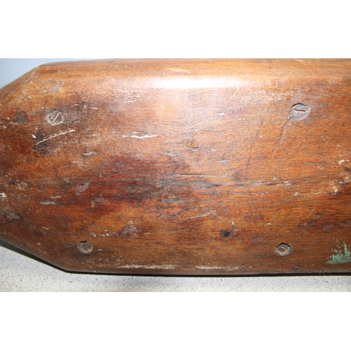 1412 - Large mystery wooden item, possibly a dummy bomb for training, approx 70cm long