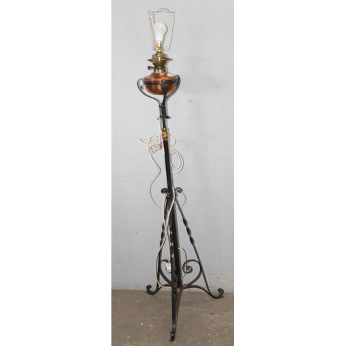 257 - 2 antique style wrought iron standard lamps both in the manner of WAS Benson, one a converted oil la... 