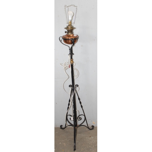 257 - 2 antique style wrought iron standard lamps both in the manner of WAS Benson, one a converted oil la... 