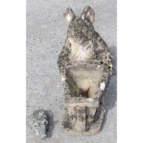 335 - Weathered concrete pig with barrow garden ornament, approx 47cm wide x 32cm deep x 60cm tall