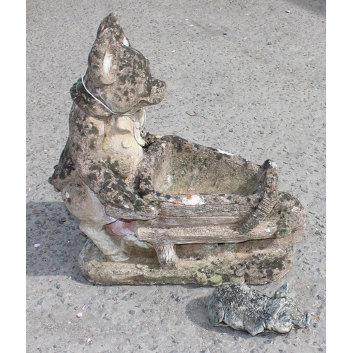 335 - Weathered concrete pig with barrow garden ornament, approx 47cm wide x 32cm deep x 60cm tall