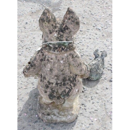 335 - Weathered concrete pig with barrow garden ornament, approx 47cm wide x 32cm deep x 60cm tall