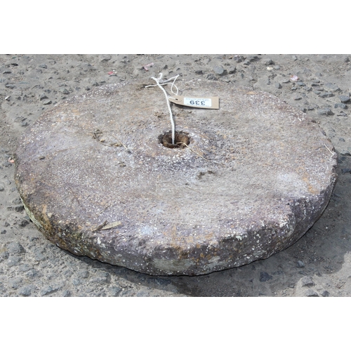 339 - A large vintage grindstone wheel, approx 42cm wide x 42cm deep x 6cm tall