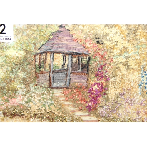 452 - Vintage woven/tapestry type picture of a woodland garden scene in glazed frame, approx 44 x 30cm