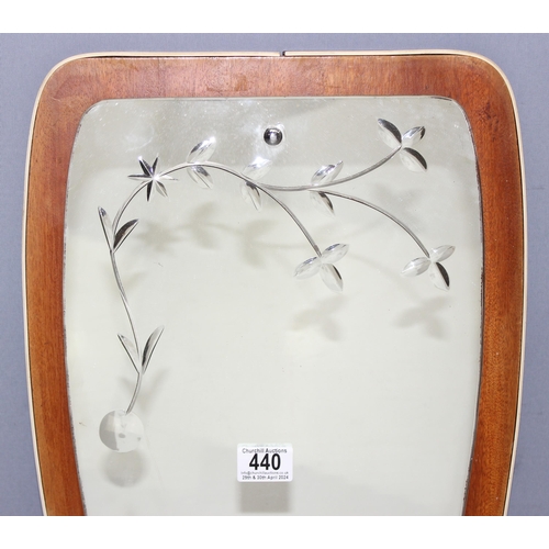 440 - Retro wall mirror on wooden backing with engraved decoration, approx 58 x 34cm