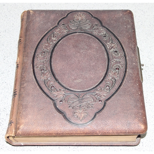 523 - Antique leather photograph album with some contents