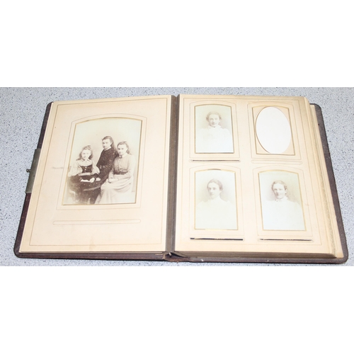 523 - Antique leather photograph album with some contents