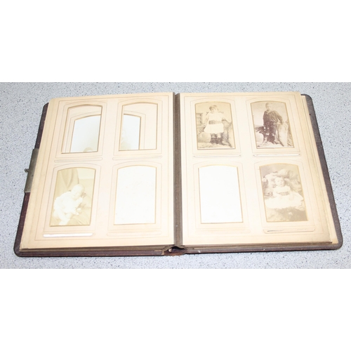 523 - Antique leather photograph album with some contents