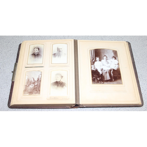 523 - Antique leather photograph album with some contents